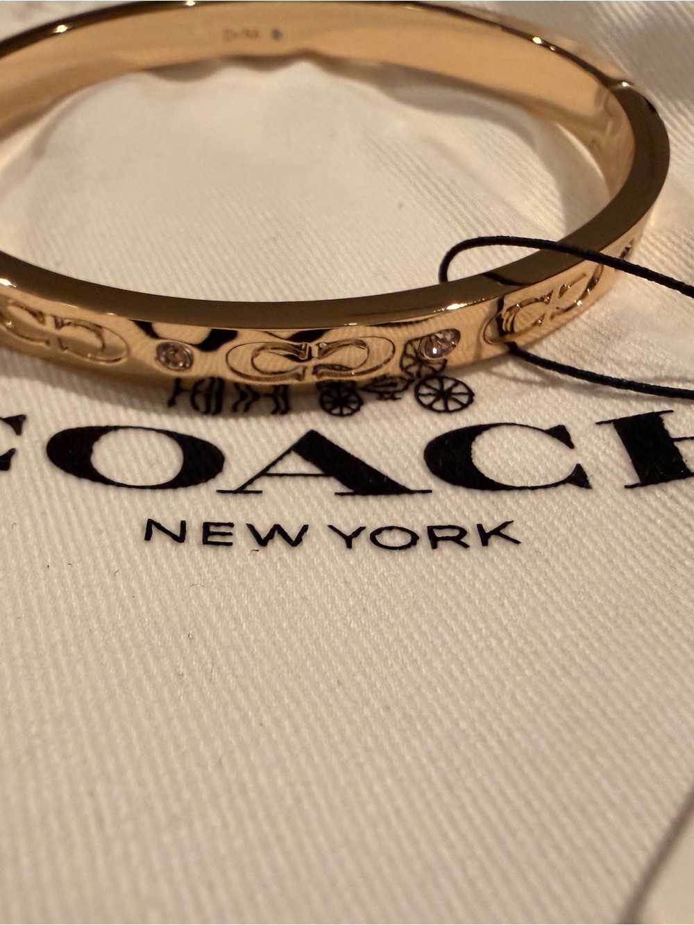 Coach Gold-Tone Signature Logo Crystal Bangle Bracelet - Picture 6 of 9